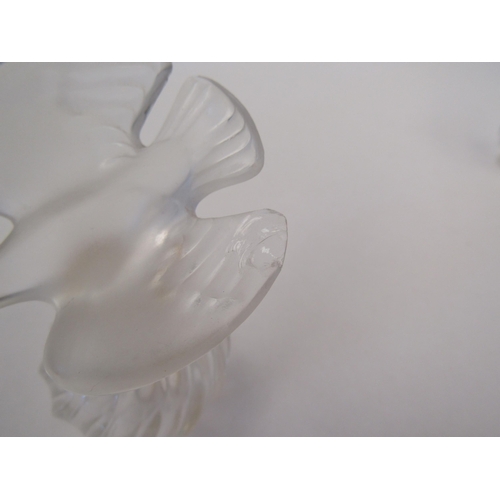 1338 - A graduated pair of Lalique perfume bottles, chips to wings of stopper