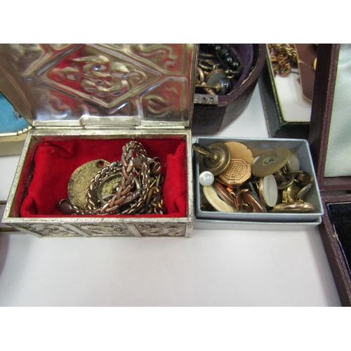 1377 - A box of bijouterie including heavy silver link bracelet, St Christopher, etc