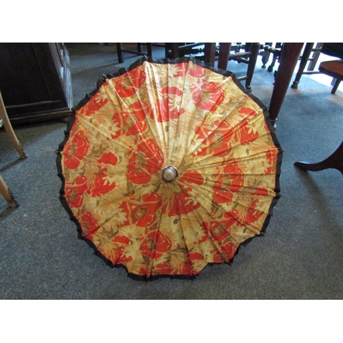 1015 - An Oriental umbrella stand with parasol contents and an Oriental vase stand