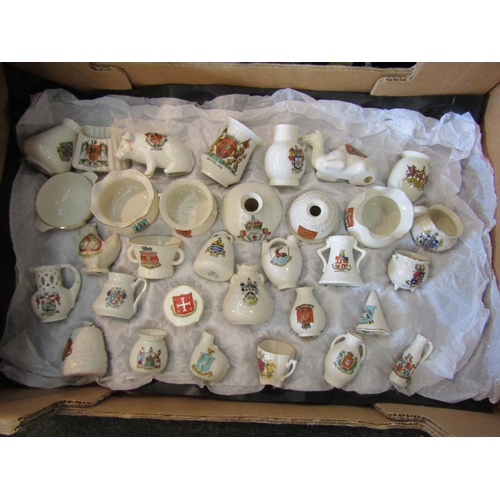 1593 - Three boxes containing crested wares including hen and pig, miniature ceramics etc.