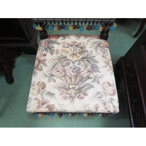 4002 - A 19th Century Cromwellian style carved oak tapestry chair on turned square legs joined by turned st... 