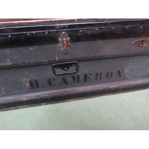 4003 - Property of Hugh Cameron, a grey painted metal banded pine travelling trunk with twin locks and inte... 