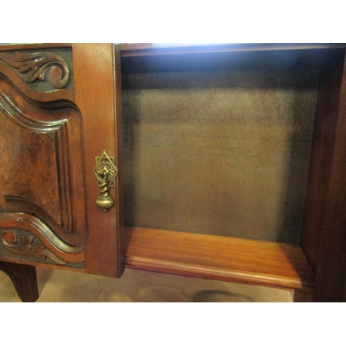 4015 - A late Victorian walnut and burr walnut two door wall cabinet/shelf with acanthus leaf carved decora... 