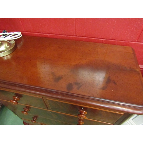 4021 - A mid Victorian flame mahogany round cornered chest of two short over three graduating long drawers ... 