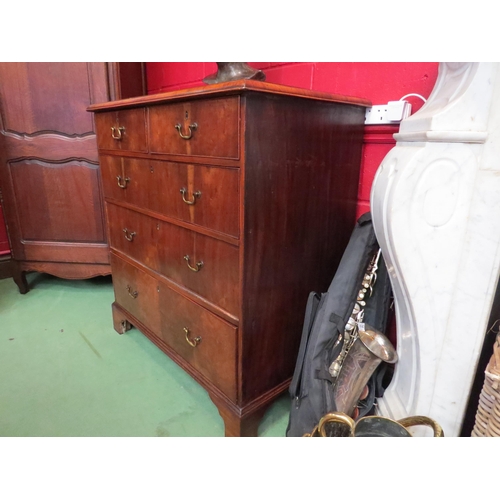 4043 - A figured walnut quarter veneer top chest of two short over three graduating long drawers with brass... 