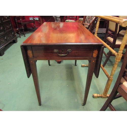 4071 - A George IV inlaid flame mahogany table the rising leaves over a fitted end drawer on square taperin... 