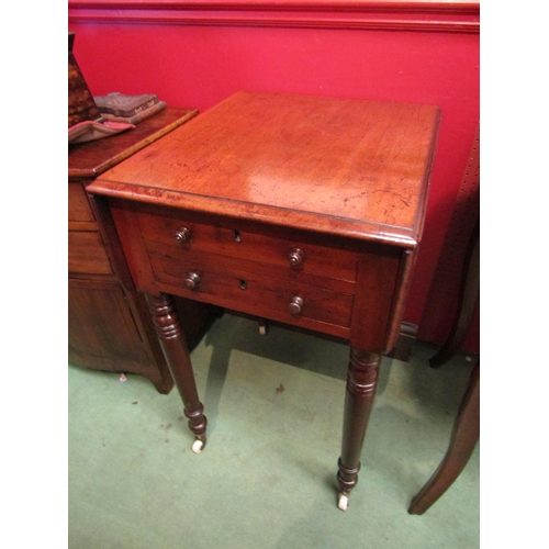 4097 - An early Victorian mahogany drop-leaf lamp table the two faux and two end drawers over turned and ta... 