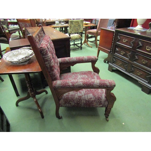 4116 - A ladies and gentleman's carved walnut pair of armchairs on castors  (C)