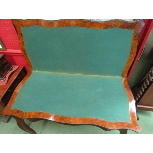 4117 - An early Victorian burr walnut serpentine shape hinged top card table the baize top with ebonised ed... 