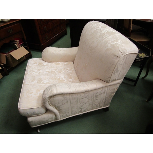 4176 - A pair of modern Howard Style upholstered armchairs of deep proportions with turned front legs and b... 