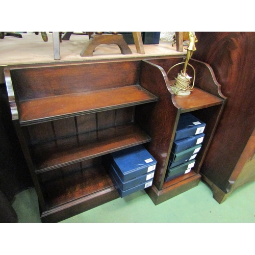 4196 - A pair of oak corner bookshelves with open shelf over a plinth base, 74cm high x 99cm wide x 35cm de... 