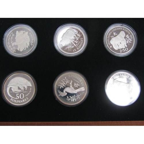 4324 - A five tray collection of Royal Mint Conservation Series of silver coins, each tray with six coins, ... 