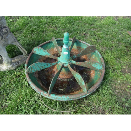 5370 - A cast iron circular pig trough with dividers and acorn finial   (R) £120