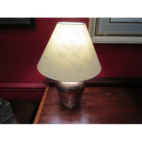 4108 - A Country and Eastern (Norwich) planished copper table lamp with cream shade. 36cm overall height