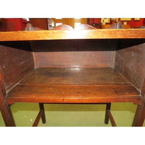 4009 - A George III mahogany night table with raised gallery over an open shelf on chamfered square legs jo... 