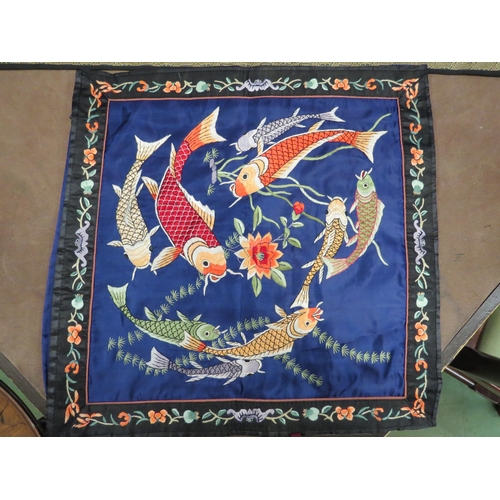 4011 - A modern Chinese silk cushion cover embroidered with stylised fish and flowers together with a moder... 