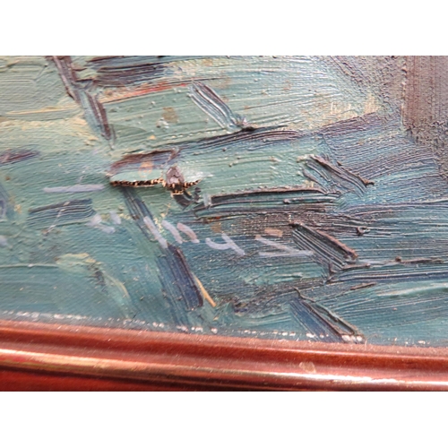 4048 - An oil on canvas depicting a Continental street scene painted in blue tones, indistinctly signed low... 