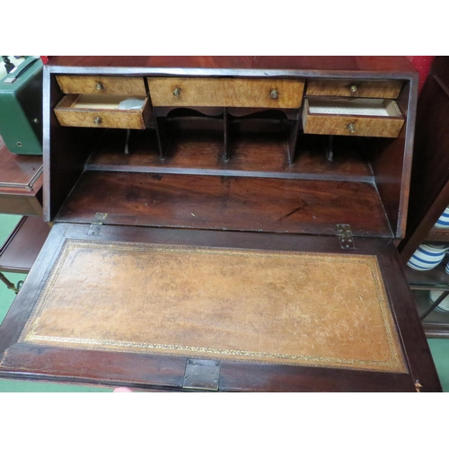 4120 - A late 19th Century mahogany bureau, a/f - lifting veneer to drop flap, 110cm high x 93cm wide x 46c... 