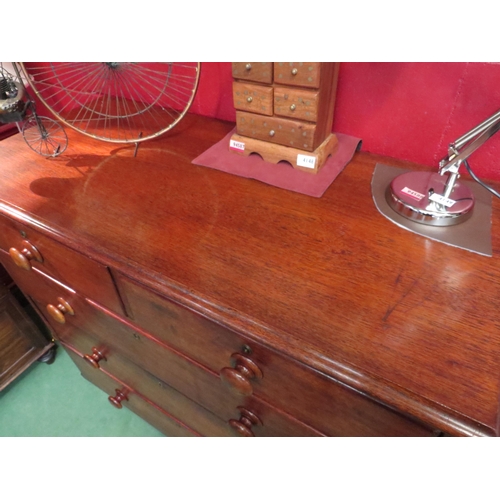 4150 - A mid Victorian walnut chest of two short over three graduating long drawers having bun handles over... 