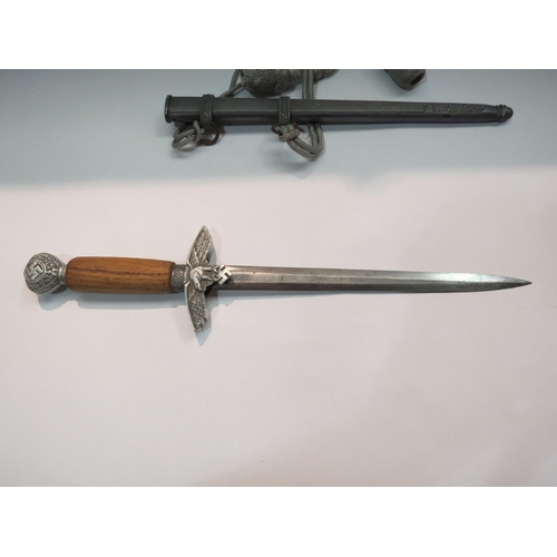 4271 - A reproduction Nazi dagger with sheath and having an Eickhorn Solingen blade