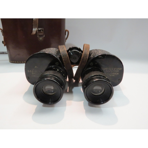 4283 - A pair of military binoculars R.E.L. / Canada 1944, cased