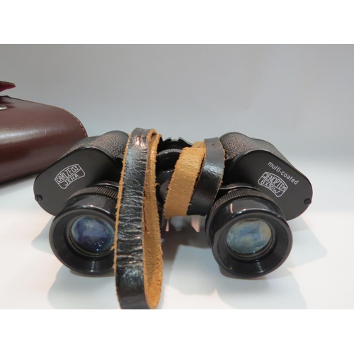 4284 - A pair of leather cased Carl Zeiss Jena Field binoculars 8x30W