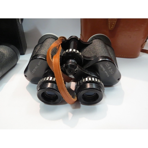 4294 - Two cased pairs of binoculars, Falcon 6-18 x 35 and Leisure Arts 10 x 50