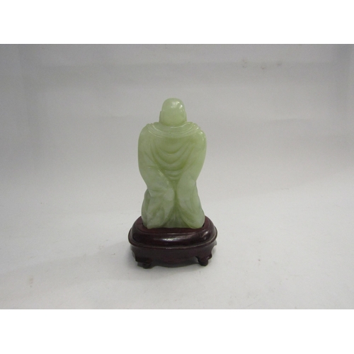 4306 - A late 20th Century Chinese jade effect Buddha on stand, 13cm high including stand