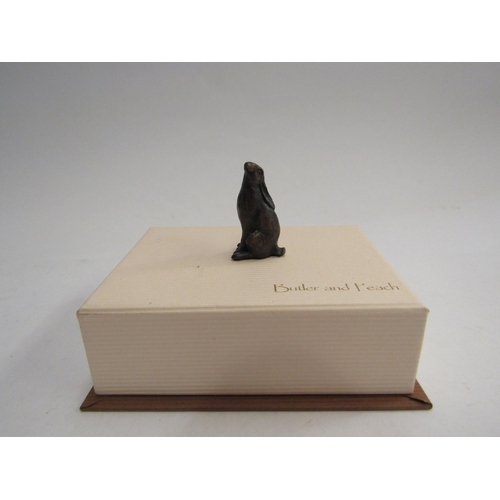 4326 - A miniature solid bronze Hare, 3cm tall   (R) £35