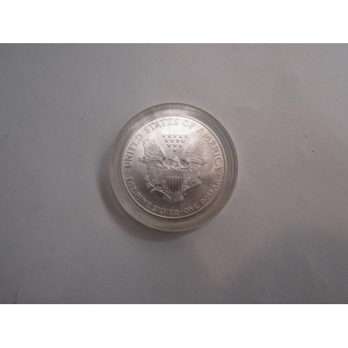 4358 - An enamelled Liberty 2000 10z fine silver one Dollar in protective coin case