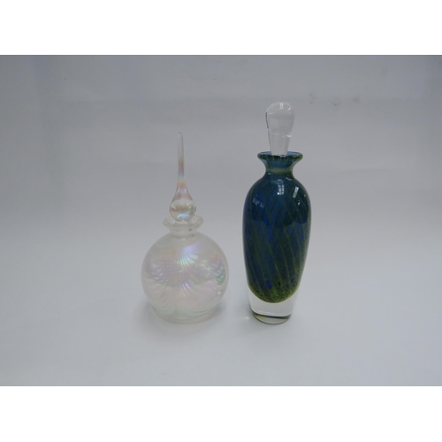 4385 - A Mdina scent bottle and stopper and a clear glass scent bottle with iridescent pattern with stopper