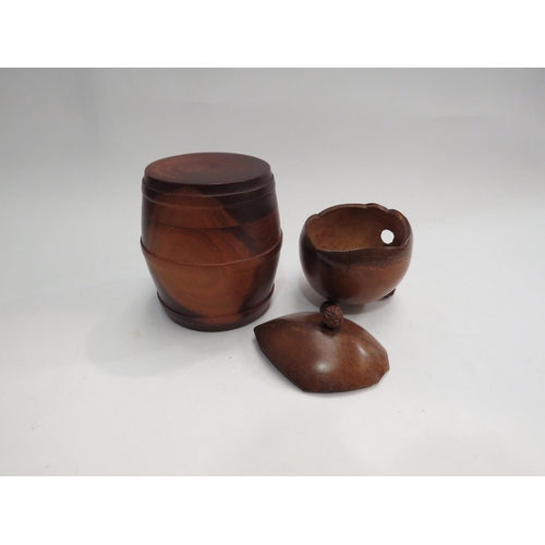 4416 - A Jamaican hardwood ashtray and tobacco/cheroot barrel together with a seedpod trinket pot (3)