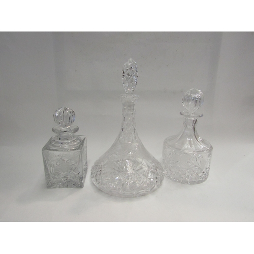 4426 - Three crystal decanters with grape and vine detail and bowl and crystal glassware with grape detail ... 