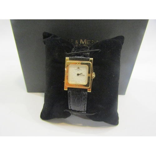 6018 - A Baume & Mercier lady's wristwatch with original brown strap, black leather B&M strap subsequently ... 