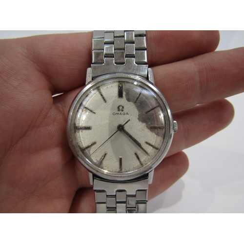 6007 - An Omega stainless steel cased manual wind gent's wristwatch, silvered dial heavily worn, centre sec... 