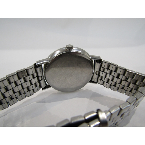 6007 - An Omega stainless steel cased manual wind gent's wristwatch, silvered dial heavily worn, centre sec... 