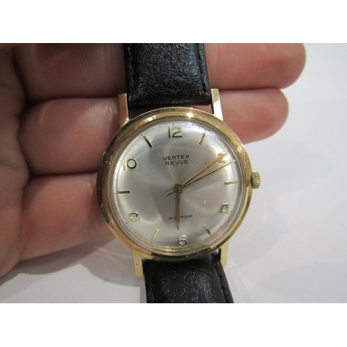 6008 - A gentleman's Vertex Revue wristwatch, with pearlised face, the back engraved with a presentation in... 