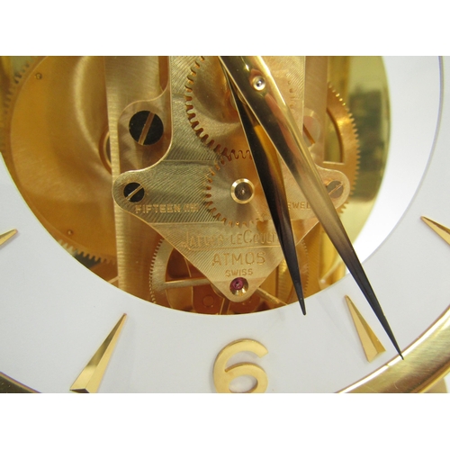 6025 - A Jaeger-LeCoultre Atmos clock, gilt and lacquered brass case, no. 540348, 30cm high approx.