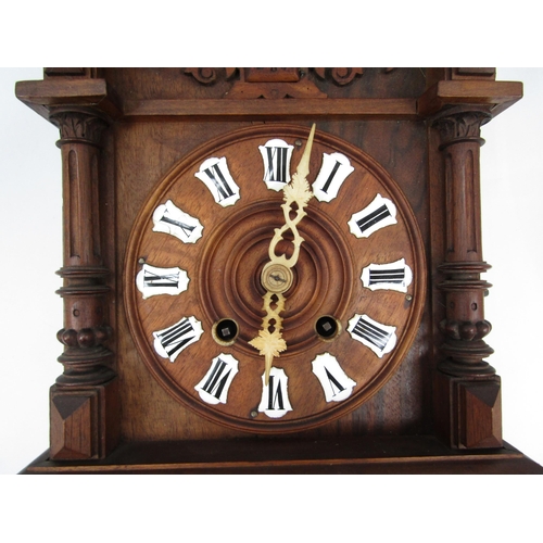 6034 - A late 19th early 20th Century German Cuckoo clock with spring driven movement in unusual wooden cas... 