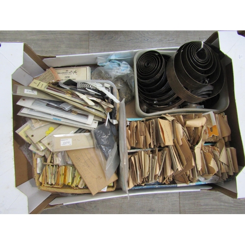 6058 - Two boxes of raw materials and consumables and spares including marksprings, glasses, fusee and gut ... 