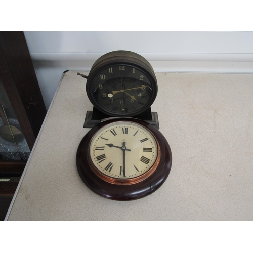 6072 - A GPO electric slave clock and a metal cased timepiece with visible pendulum and escape wheel on dia... 