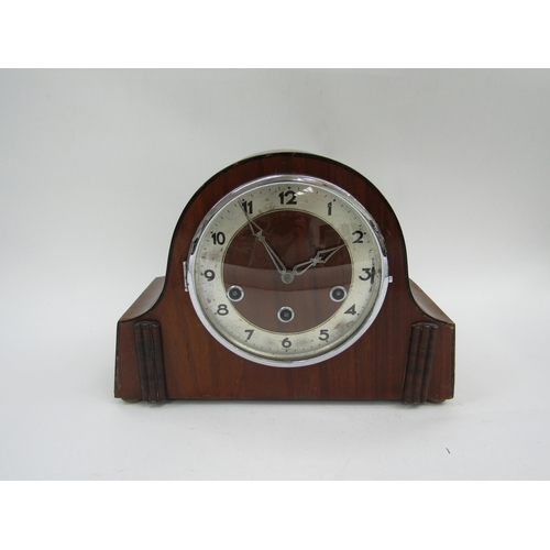 6073 - An early 20th Century Gustav Becker striking and chiming mantel clock in walnut case (minute hand mi... 