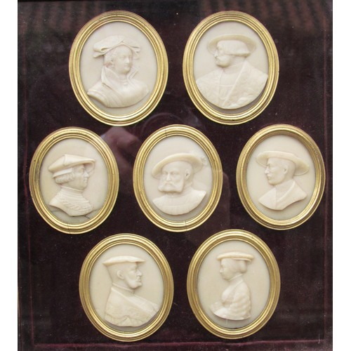 9044 - A late 19th Century group of seven wax relief oval portraits of Tudor Dignitaries set on a plum velv... 