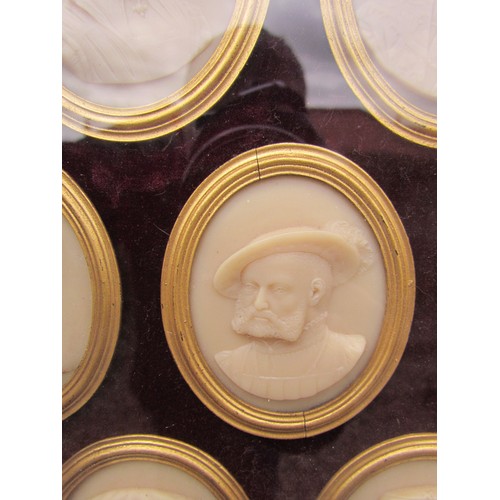 9044 - A late 19th Century group of seven wax relief oval portraits of Tudor Dignitaries set on a plum velv... 
