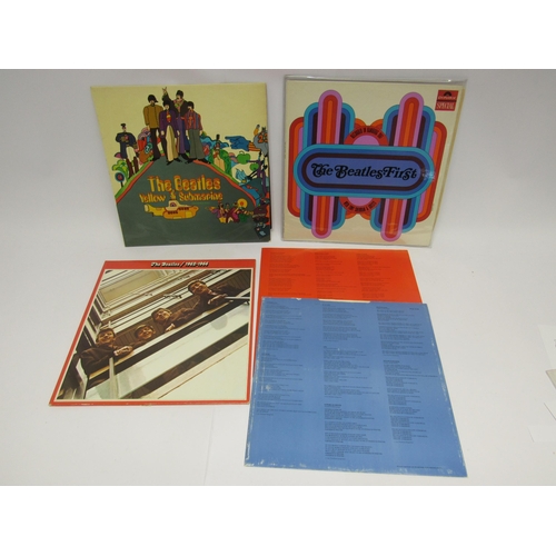 8218 - THE BEATLES: Three LP's to include 'Yellow Submarine' original UK stereo pressing with red lines to ... 