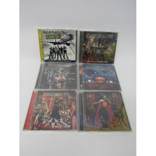 8242 - IRON MAIDEN: Five CD's, each of which signed by Janick Gers, to include 'Flight 666', 'A Matter Of L... 