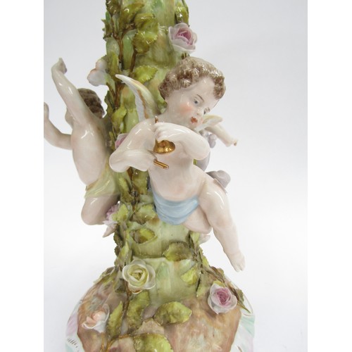 9021 - A mid to late 19th Century German porcelain table centrepiece basket with three frolicking cherubs, ... 