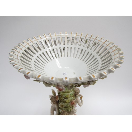 9021 - A mid to late 19th Century German porcelain table centrepiece basket with three frolicking cherubs, ... 
