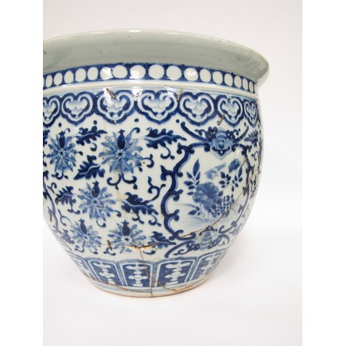 9039 - A Chinese blue and white jardinière in the Ming style, all-over scrolled foliate patterns, 35.5cm di... 