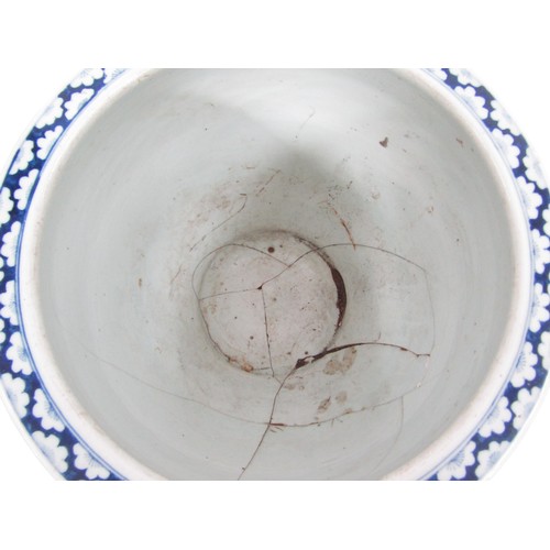 9039 - A Chinese blue and white jardinière in the Ming style, all-over scrolled foliate patterns, 35.5cm di... 